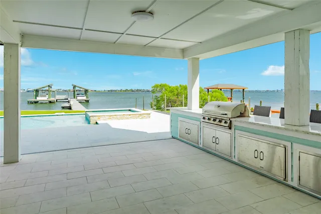 a large bathroom with a sink and mirror