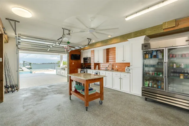 a living room with furniture wooden floor and a flat screen tv