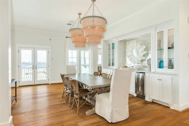 a spacious bathroom with a granite countertop sink mirror and a bathtub