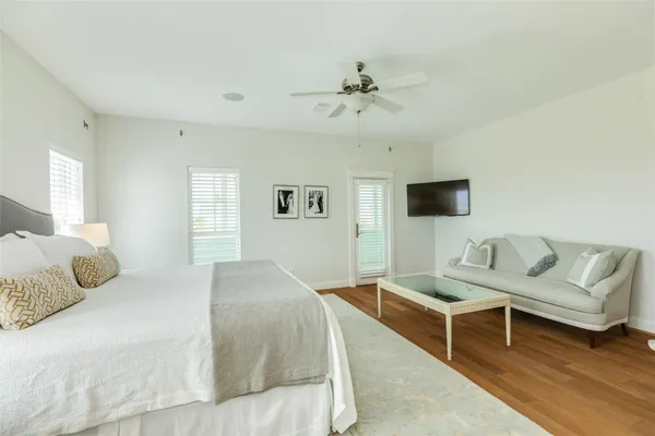 a spacious bathroom with a sink a large mirror and a shower
