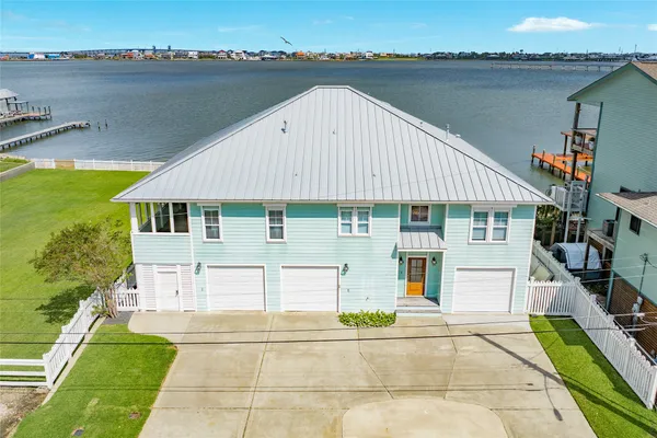 a aerial view of a house with swimming pool