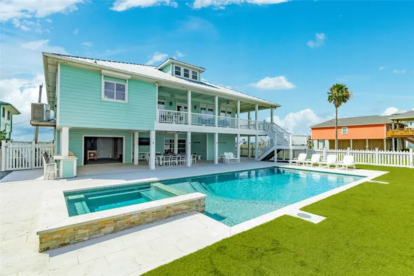 a view of a house with swimming pool