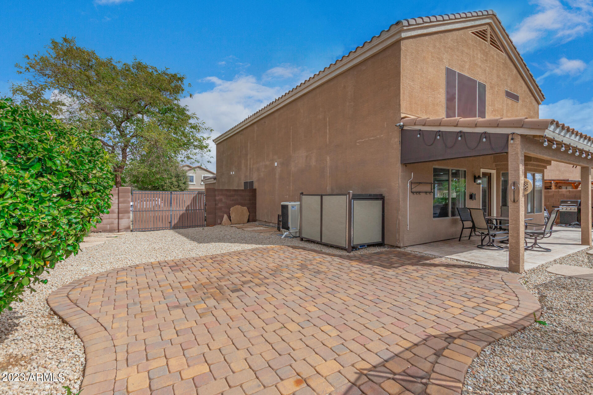 2561 West Tanner Ranch Road Queen Creek, AZ 85144 - Photo 34 of 36 a front view of a house with entryway