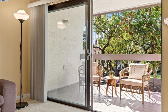 a view of front door and porch with furniture