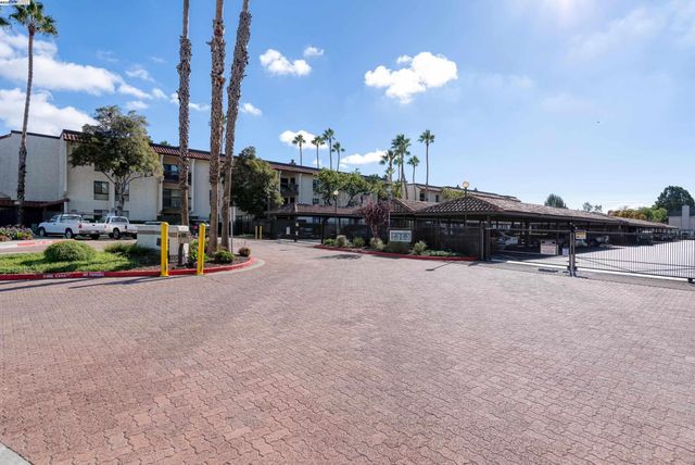 a view of street with sitting area