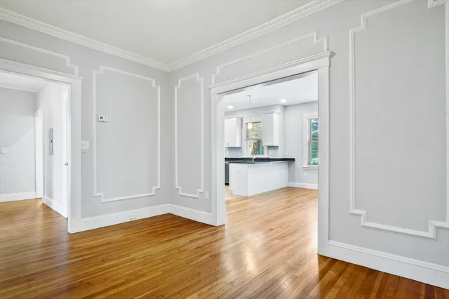 a view of kitchen with wooden floor
