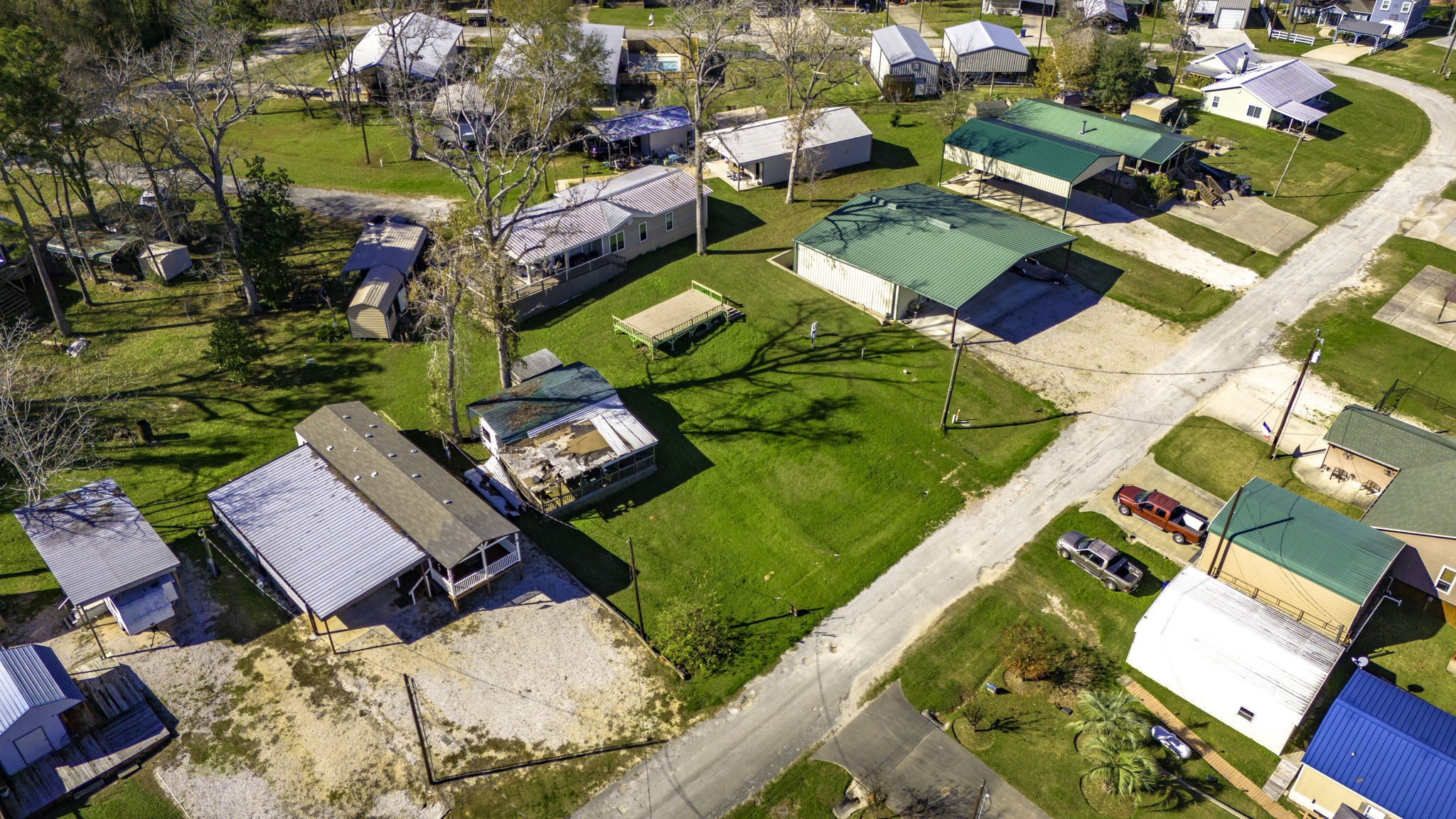 240 Key Largo Loop Point Blank, TX 77364 - Photo 12 of 12 an aerial view of residential houses with outdoor space