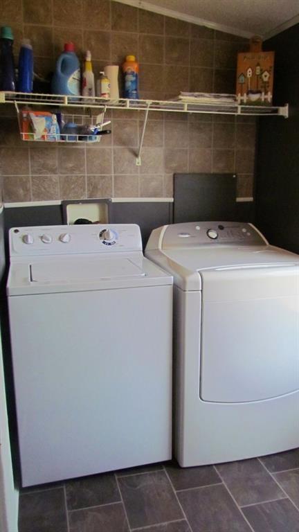 1317 Poole Gooden Road Hiddenite, NC 28636 - Photo 28 of 36 a utility room with dryer and washer