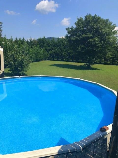 1317 Poole Gooden Road Hiddenite, NC 28636 - Photo 35 of 36 a view of a tennis court