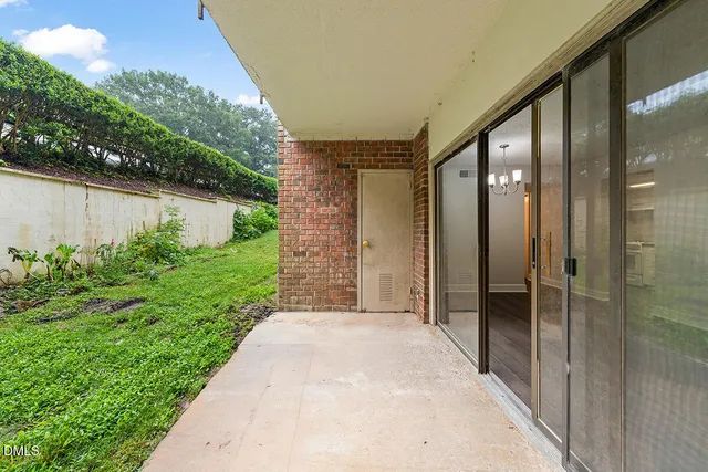 a view of a bathroom with shower and yard