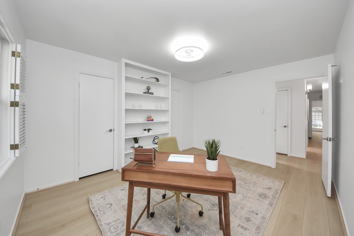 10719 Burgoyne Road Houston, TX 77042 - Photo 16 of 36 Bedroom #2 is generously sized, offers double closets, and is currently staged as an office but can be adapted to fit your needs.