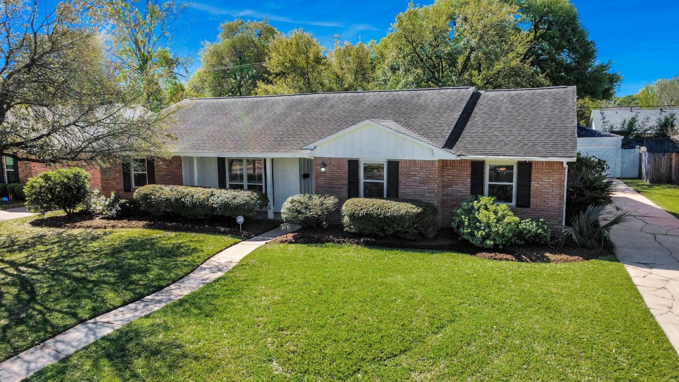 10719 Burgoyne Road Houston, TX 77042 - Photo 3 of 36 Welcome to 10719 Burgoyne Rd, a charming traditional brick home nestled in a well-established neighborhood. Roof replaced in 2015.