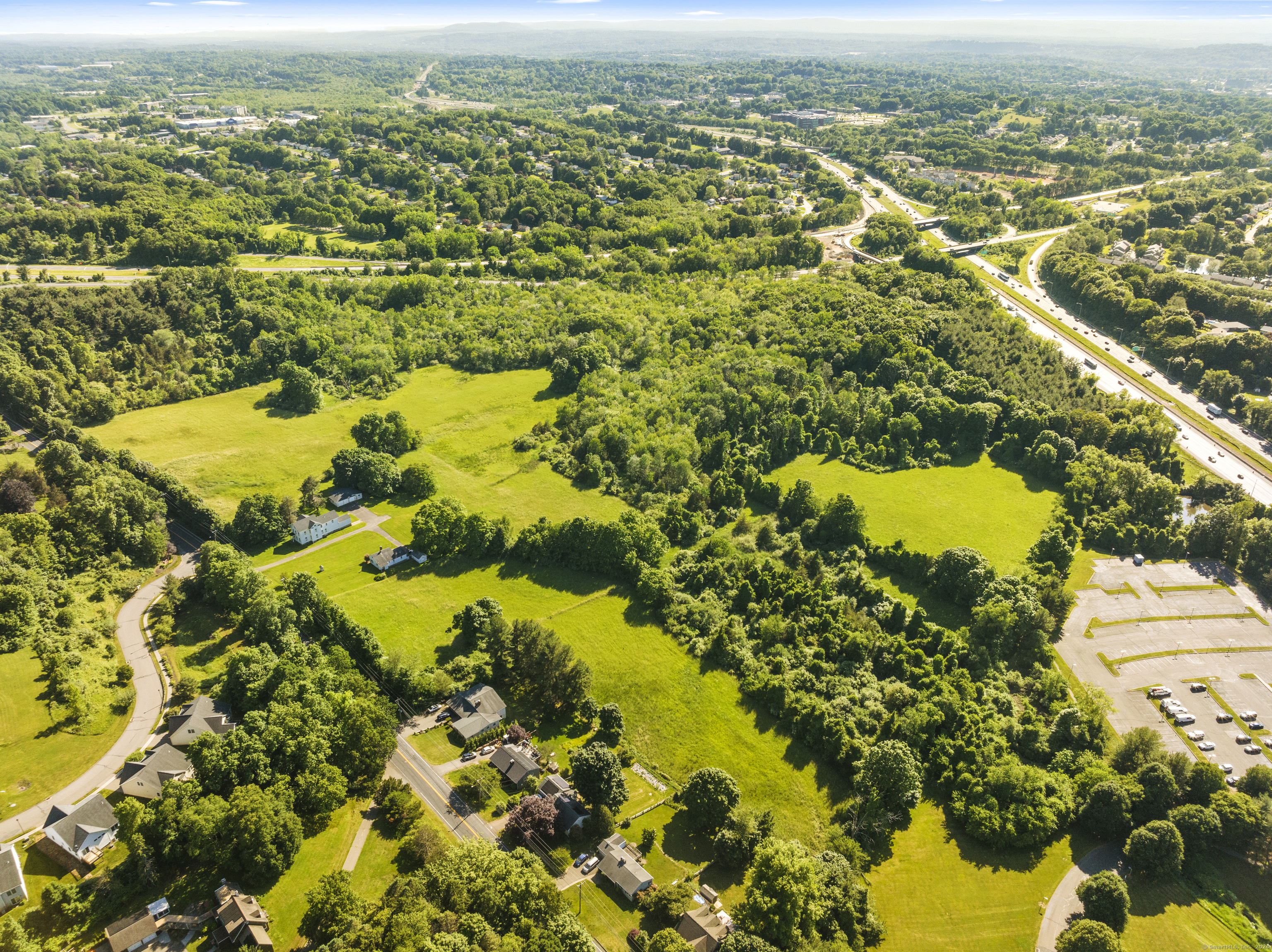 436-444 Preston Avenue Meriden, CT 06450 - Photo 2 of 14 an aerial view of residential houses with outdoor space