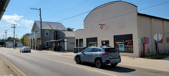 a car parked in front of a house