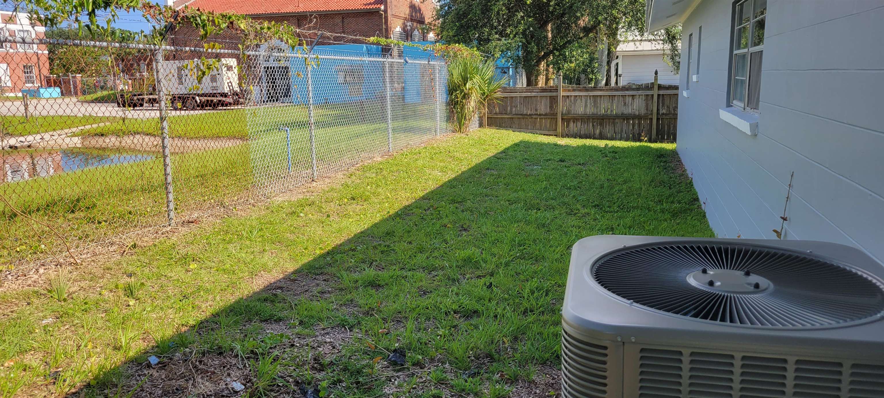 3 Travis Lane St. Augustine, FL 32084 - Photo 3 of 27 a view of a backyard