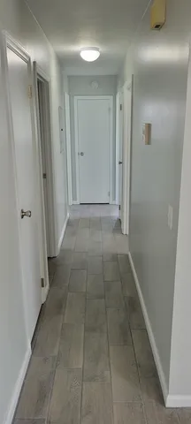 a view of hallway with shower