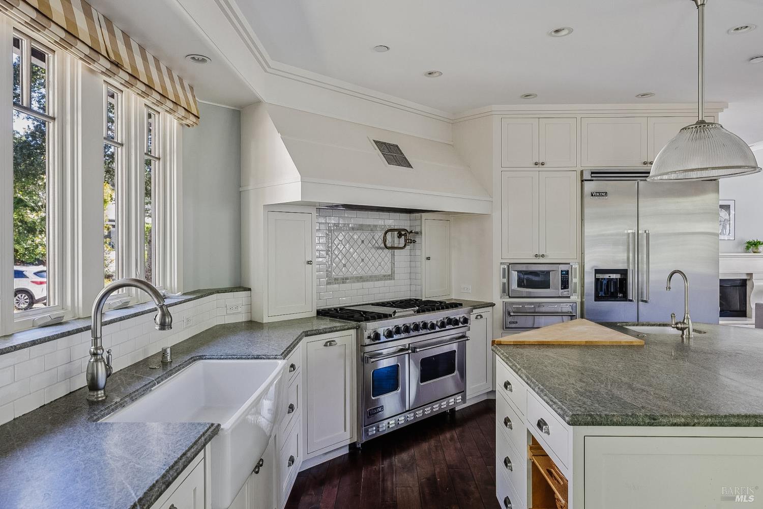 529 Alta Way Mill Valley, CA 94941 - Photo 18 of 58 a kitchen with stainless steel appliances granite countertop a sink stove and refrigerator