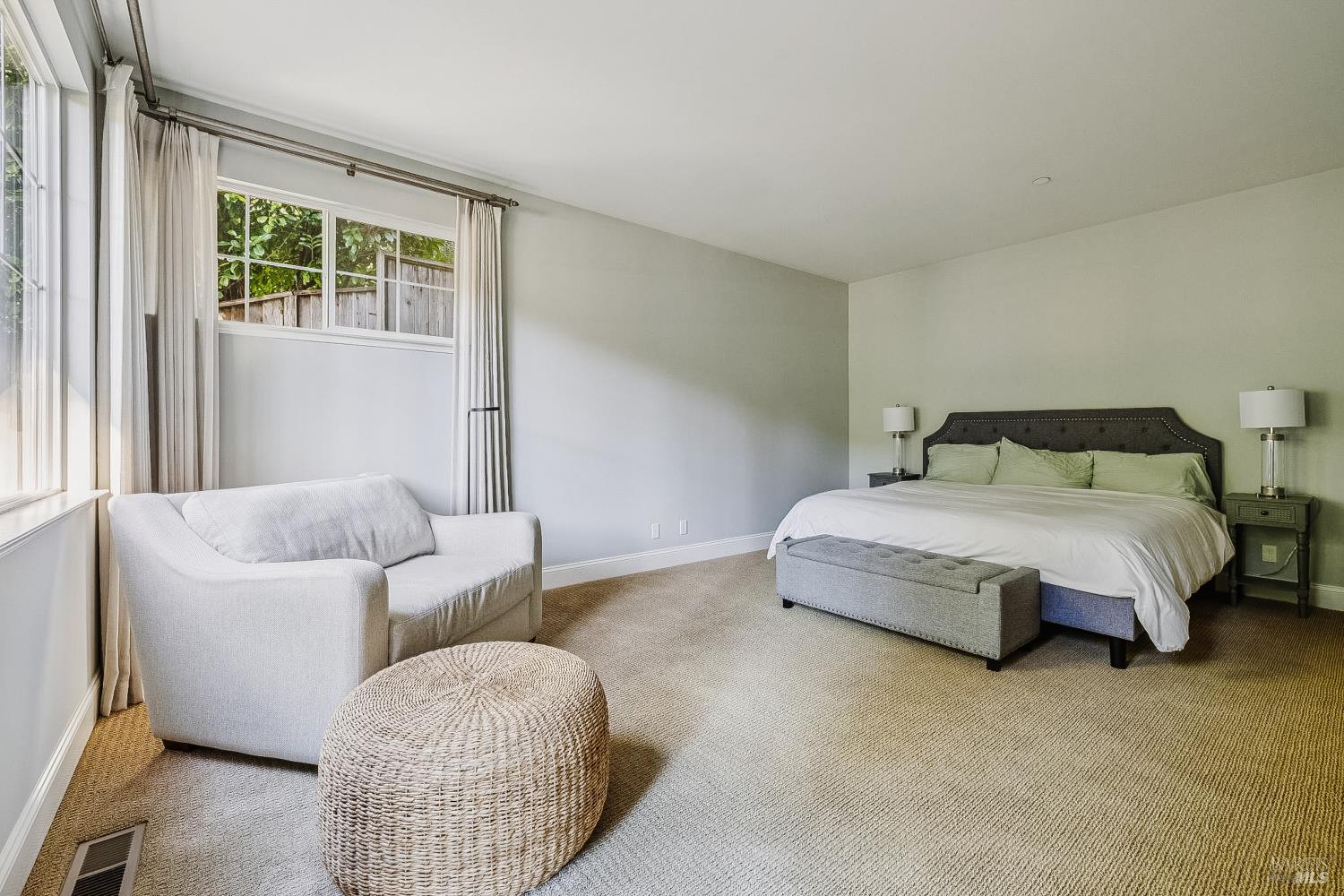 529 Alta Way Mill Valley, CA 94941 - Photo 27 of 58 a bedroom with bed couch and window