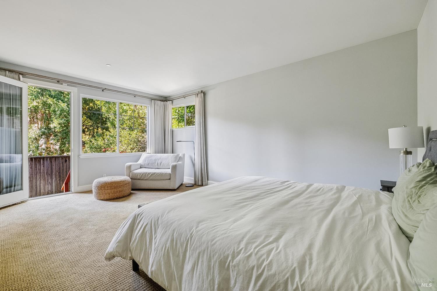529 Alta Way Mill Valley, CA 94941 - Photo 28 of 58 a bedroom with a bed and large window
