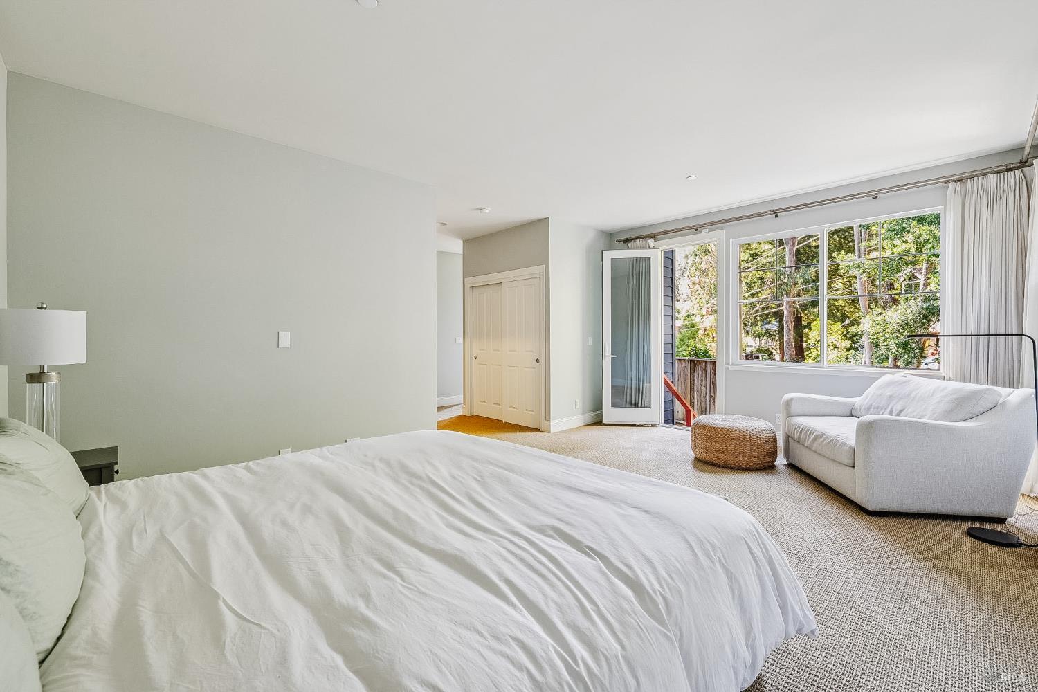 529 Alta Way Mill Valley, CA 94941 - Photo 29 of 58 a bedroom with a large bed couch and window