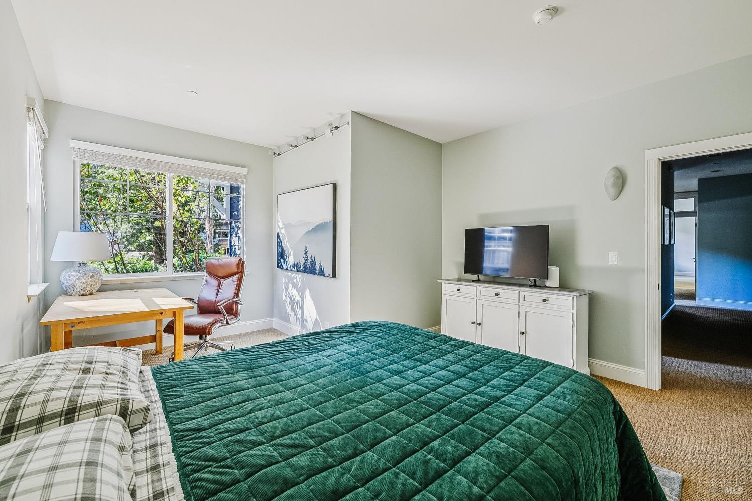 529 Alta Way Mill Valley, CA 94941 - Photo 34 of 58 a bedroom with a bed and a large window