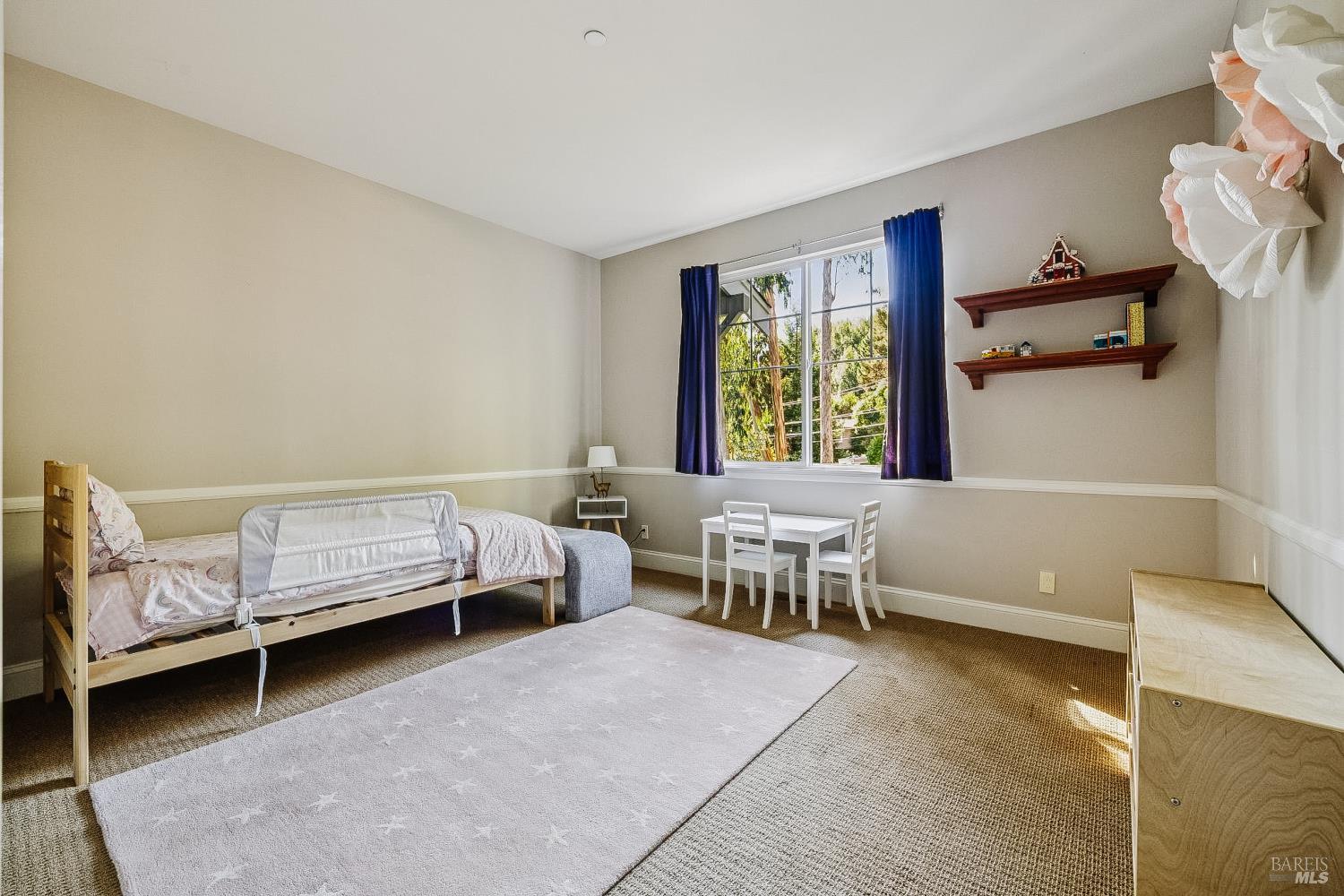 529 Alta Way Mill Valley, CA 94941 - Photo 36 of 58 a bedroom with furniture and a window
