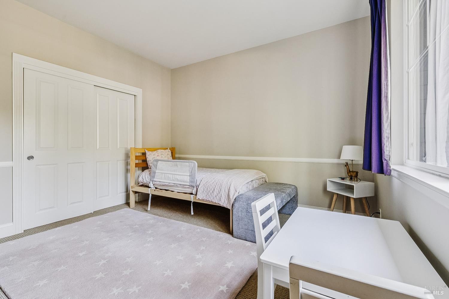 529 Alta Way Mill Valley, CA 94941 - Photo 39 of 58 a bedroom with a bed and a window