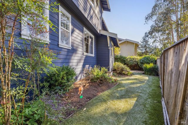 a view of dining area with table and chairs