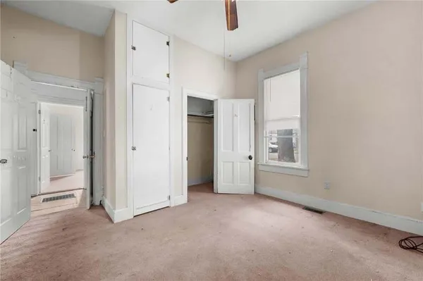 a bathroom with a sink mirror toilet and bathtub