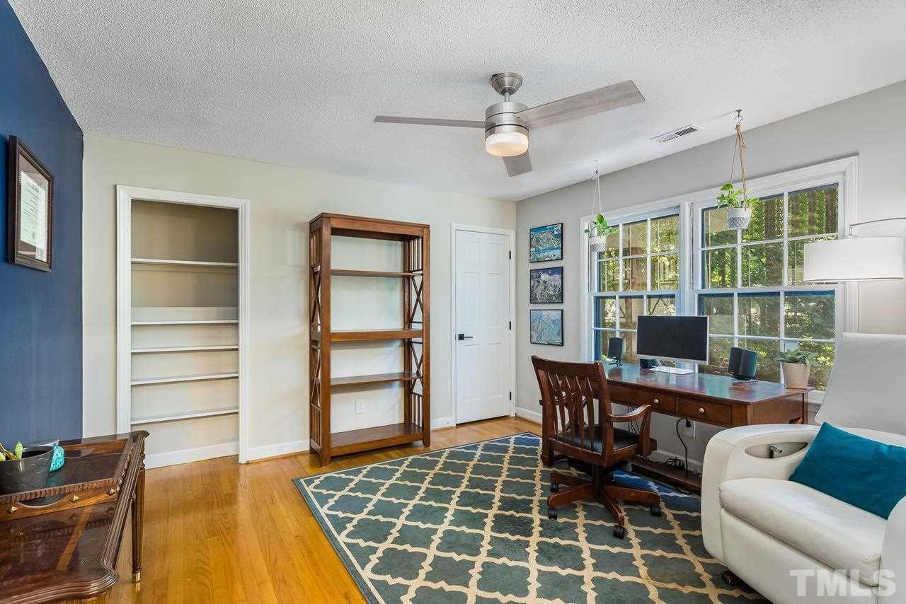 9028 Oneal Road Raleigh, NC 27613 - Photo 22 of 30 a view of a livingroom with furniture and window
