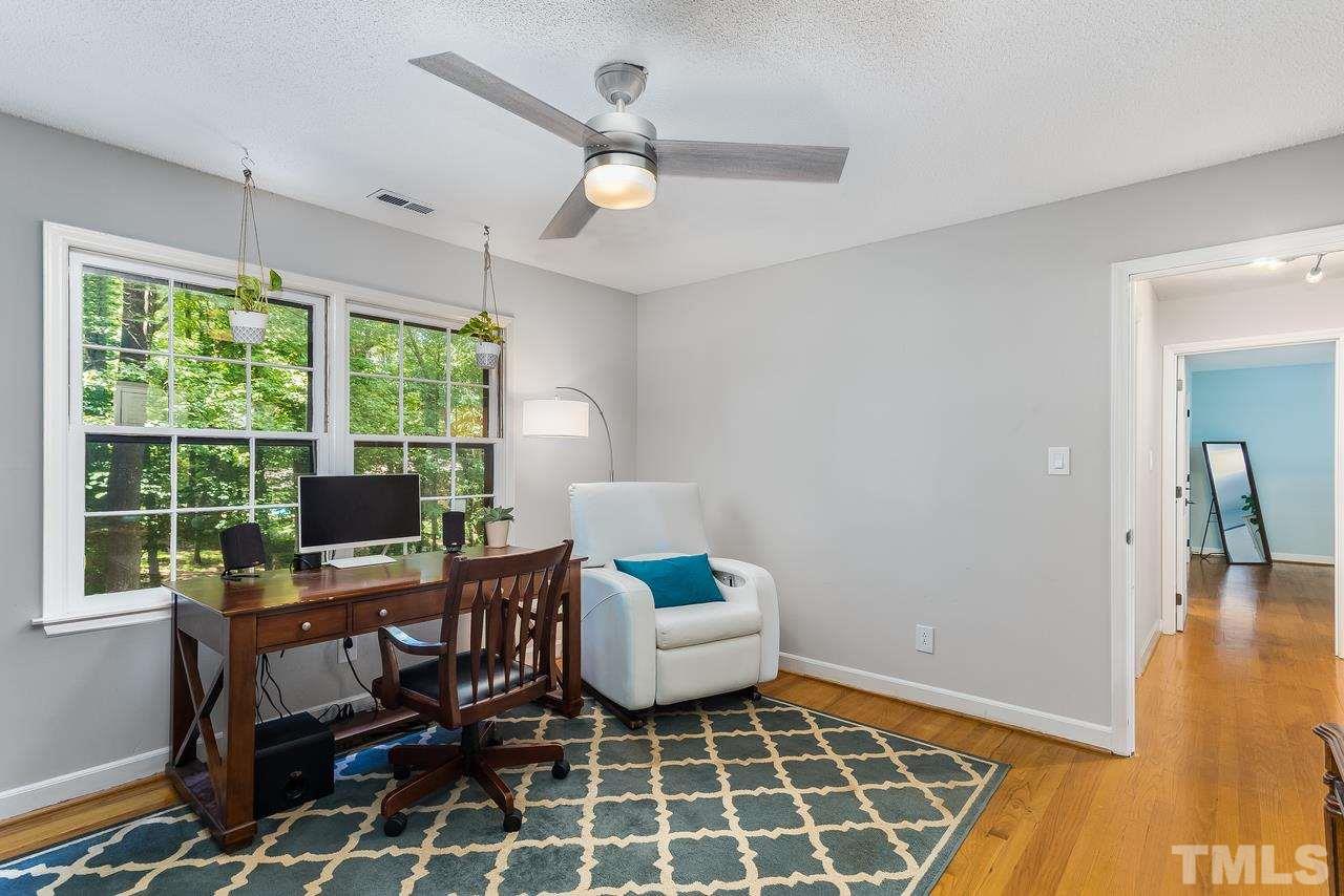 9028 Oneal Road Raleigh, NC 27613 - Photo 23 of 30 a workspace with furniture and a window