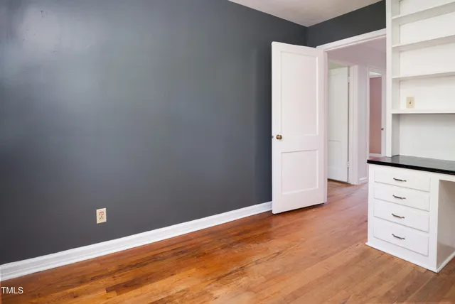 an aerial view of residential house with outdoor space and swimming pool