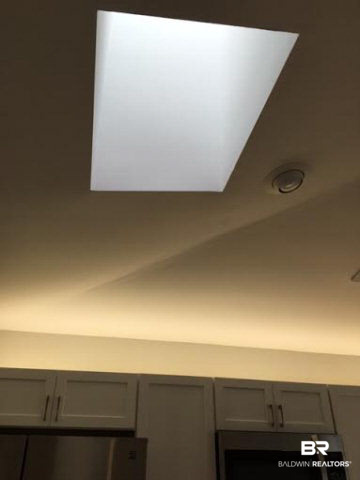 320 West Fort Morgan Road, Unit 103 Gulf Shores, AL 36542 - Photo 3 of 11 Multiple Skylights.Tons of natural light throughout home.