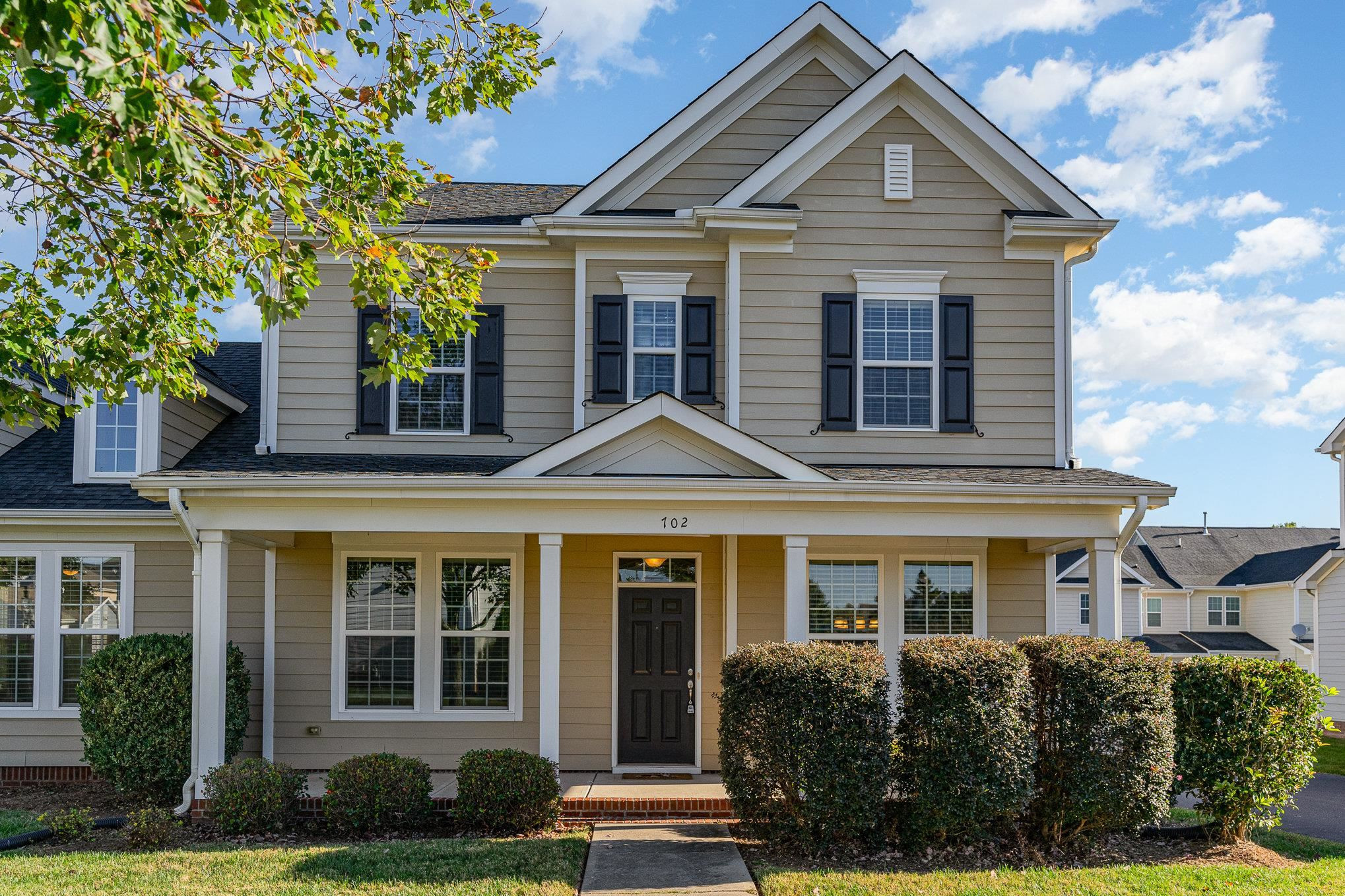 702 Chapanoke Road Raleigh, NC 27603 - Photo 1 of 39 a front view of a house with garden