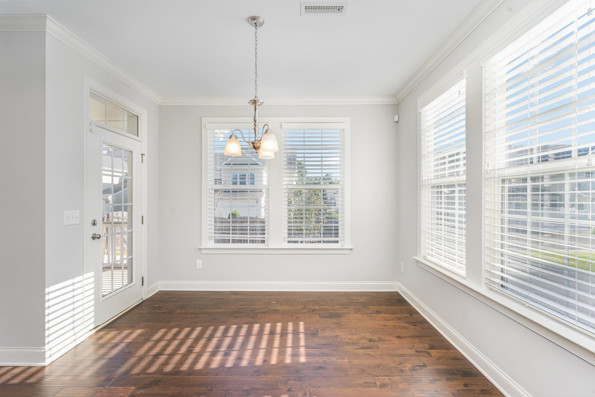 702 Chapanoke Road Raleigh, NC 27603 - Photo 11 of 39 a view of an empty room with a window