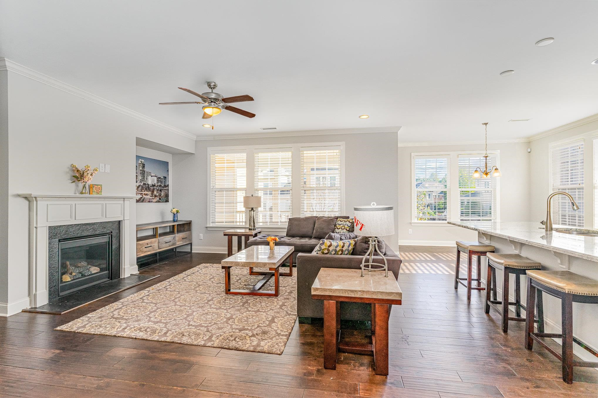 702 Chapanoke Road Raleigh, NC 27603 - Photo 13 of 39 a living room with furniture fireplace and window