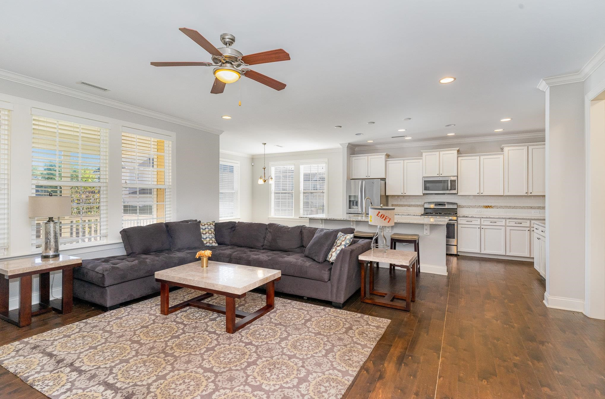 702 Chapanoke Road Raleigh, NC 27603 - Photo 14 of 39 a living room with furniture kitchen view and a large window