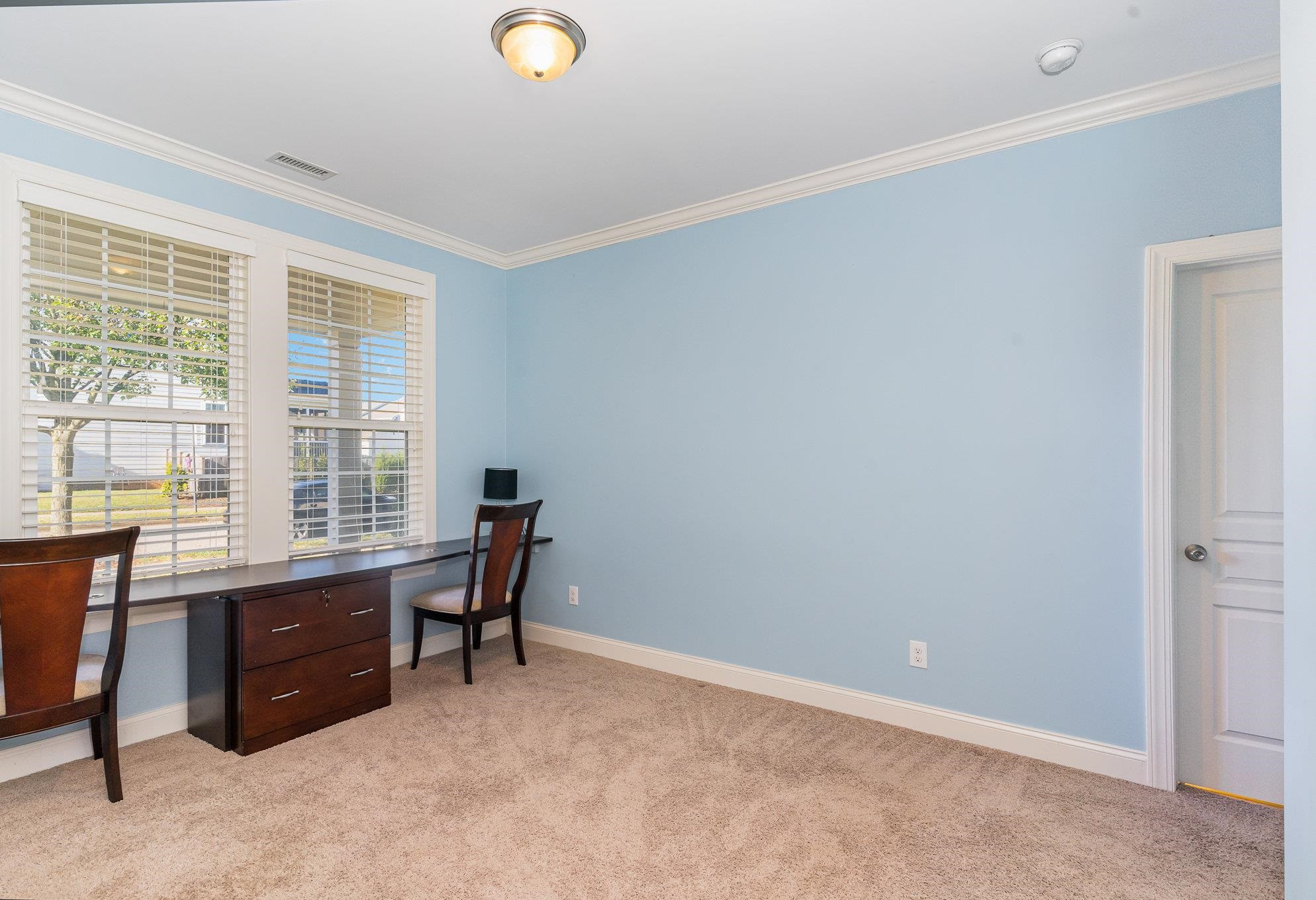 702 Chapanoke Road Raleigh, NC 27603 - Photo 15 of 39 a view of workspace with a window
