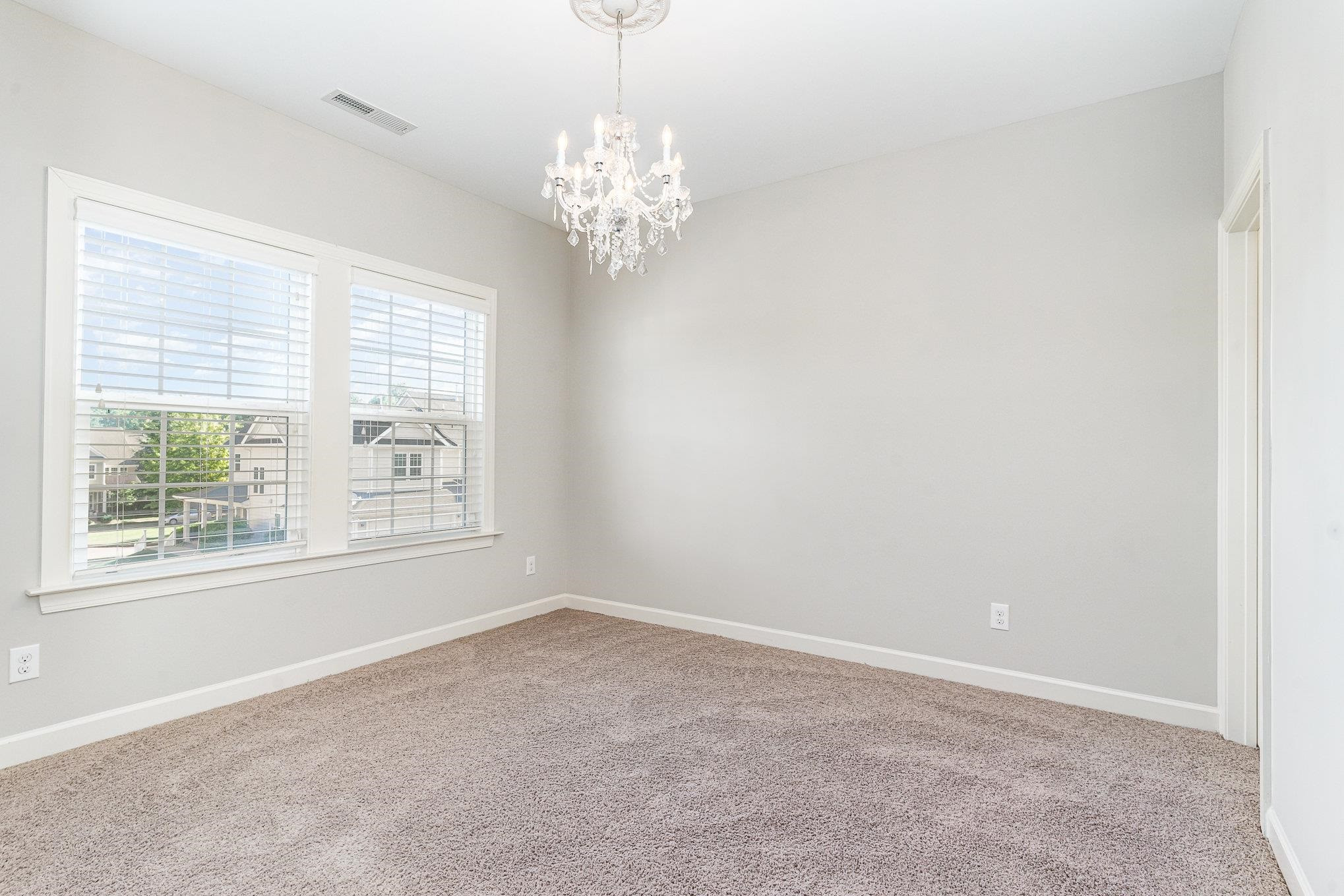 702 Chapanoke Road Raleigh, NC 27603 - Photo 27 of 39 a view of empty room with window