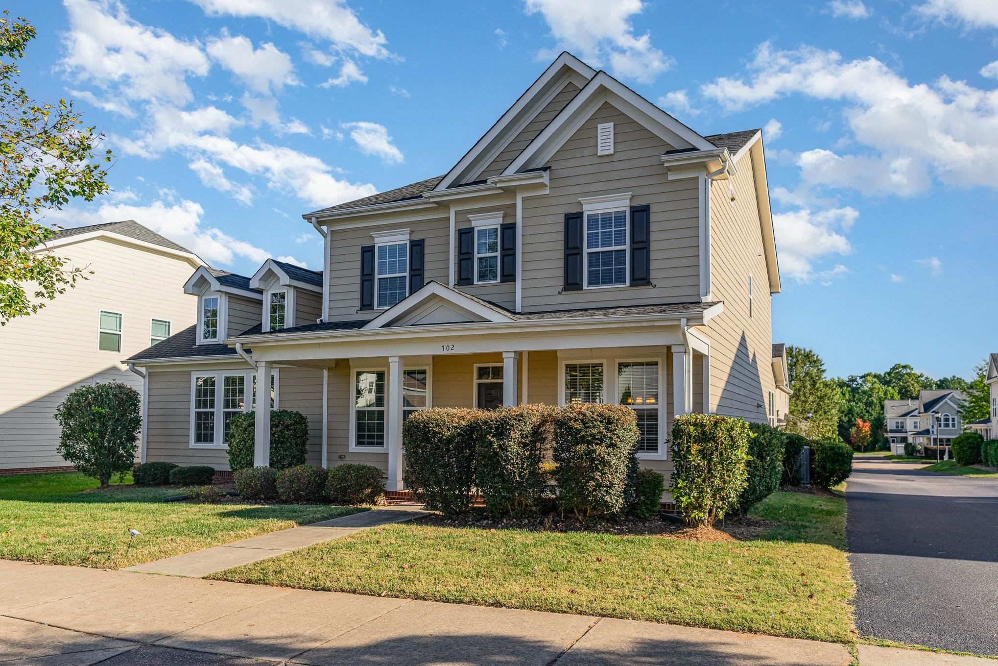 702 Chapanoke Road Raleigh, NC 27603 - Photo 3 of 39 a front view of a house with a yard
