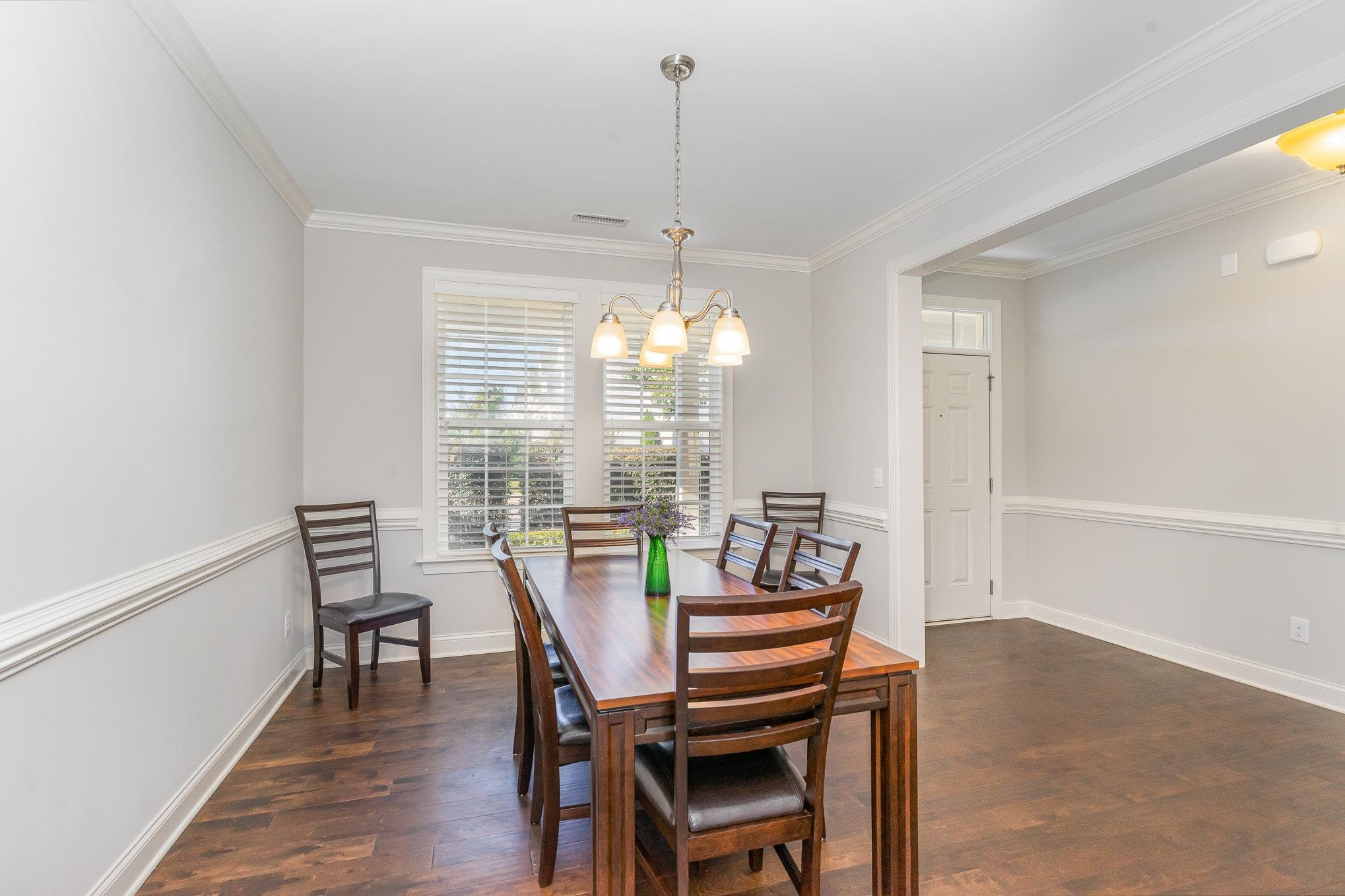702 Chapanoke Road Raleigh, NC 27603 - Photo 7 of 39 a view of a dining room with furniture window and outside view