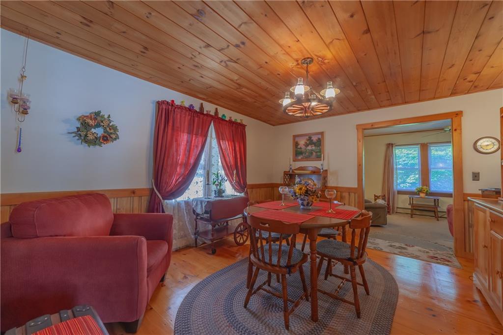 135 Lobster Cove Road Boothbay Harbor, ME 04538 - Photo 7 of 21 The dining room with pine ceiling...