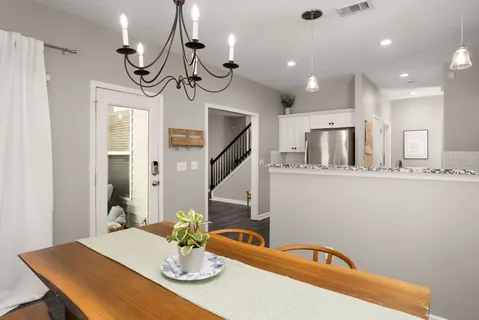 a view of a dining room with furniture