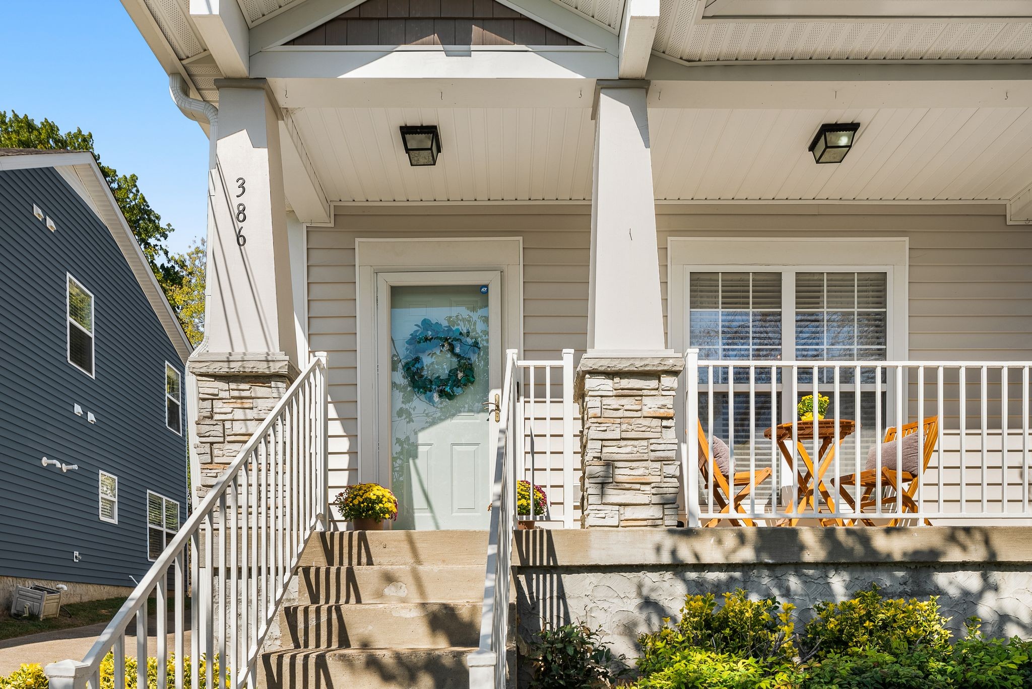 386 Normandy Circle Nashville, TN 37209 - Photo 2 of 30 a view of balcony with two chairs and potted plants