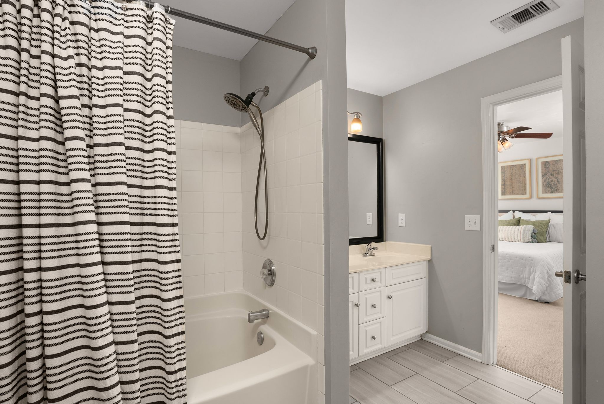 386 Normandy Circle Nashville, TN 37209 - Photo 25 of 30 a bathroom with a bathtub and a shower