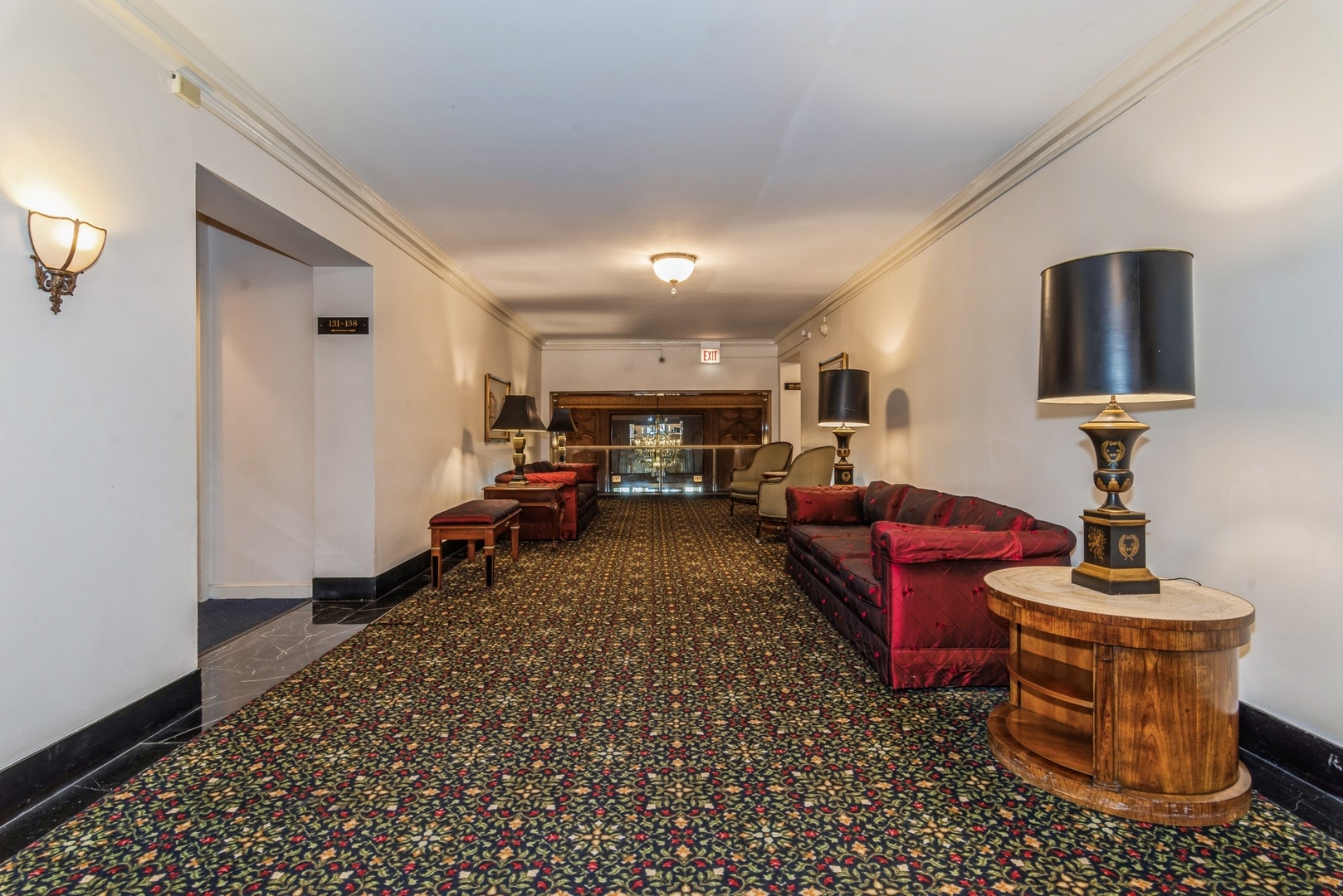 5555 North Sheridan Road, Unit 1908 Chicago, IL 60640 - Photo 13 of 13 a living room with furniture a rug and a window