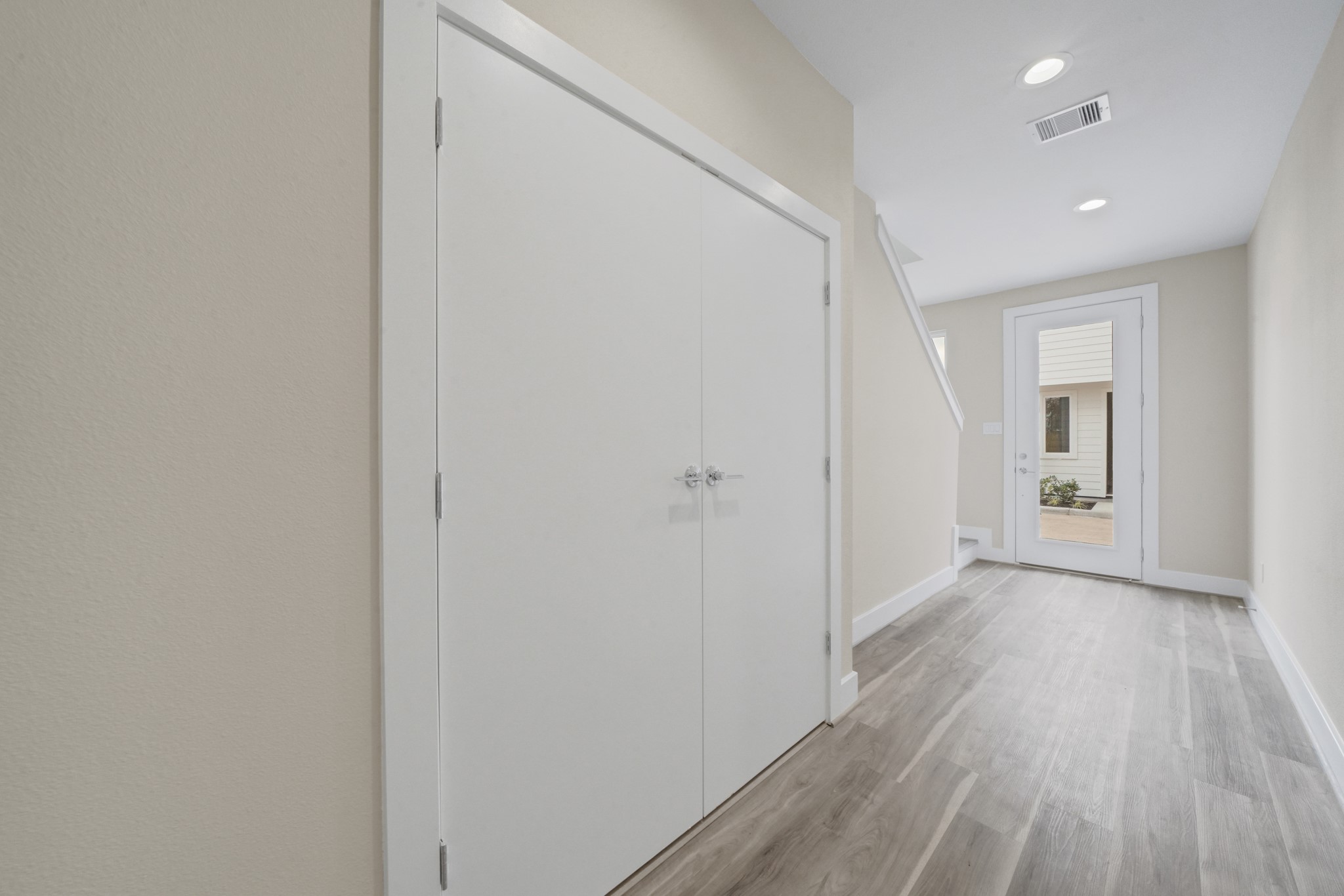 2502 West Tidwell Road, Unit A Houston, TX 77091 - Photo 22 of 22 a view of a hallway with wooden floor