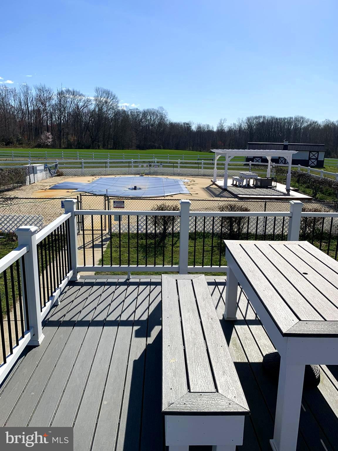 120 Oechsle Road Woodstown, NJ 08098 - Photo 9 of 14 a view of a swimming pool with a lounge chair