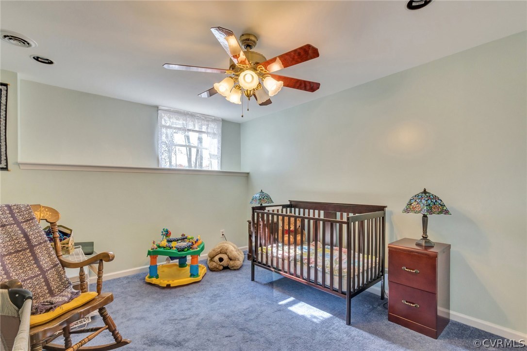 717 Landover Road Troy, VA 22974 - Photo 14 of 48 a bedroom with furniture and a chandelier