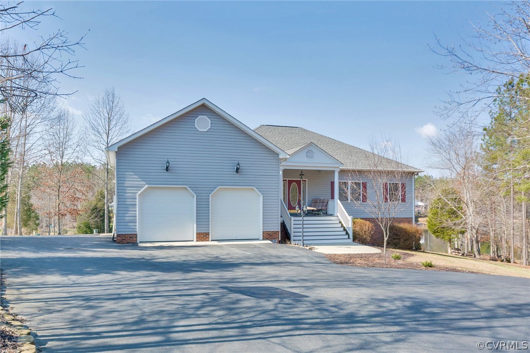 717 Landover Road Troy, VA 22974 - Photo 4 of 48 a view of a house with a wooden bench